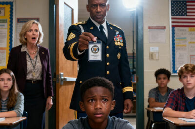 “My dad works at the Pentagon,” the Black boy whispered. Laughter burst out immediately. The teacher folded her arms and sneered, “You really think we believe that kind of bragging?” The boy stayed silent, eyes glistening. Ten minutes later, heavy military boots echoed down the hallway. A high-ranking officer stepped into the classroom, his military ID gleaming in his hand. He looked around and said sternly, “Who called my son a liar?”