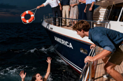 On the luxury yacht, my sister was pushed off the deck “for fun.” A man burst out laughing and shouted, “John, you did it! I owe you fifty bucks!” Her husband’s whole family roared with laughter as if it were a show, while my sister thrashed in the dark waves, screaming for help. John tossed down a single life ring, smirking. The moment I pulled her back onto the deck, I made one call: “Come. Now.” Let them laugh — we’ll see how many of them make it to shore.