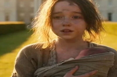 A poor girl holding her baby sister begged a billionaire for help… One small detail changed everything forever