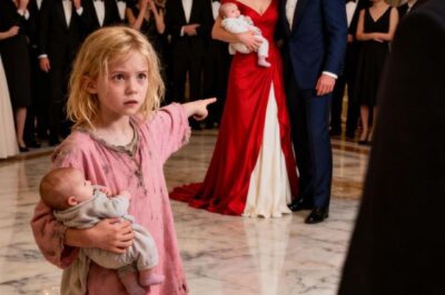 A billionaire was celebrating his engagement… until a homeless girl burst into the party with a baby in her arms and pointed at the bride, freezing the entire room in place…