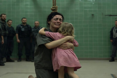 “Mommy… they’re not going to kill you today,” the eight-year-old girl whispered in the condemned woman’s ear… and what happened next left the guards breathless.